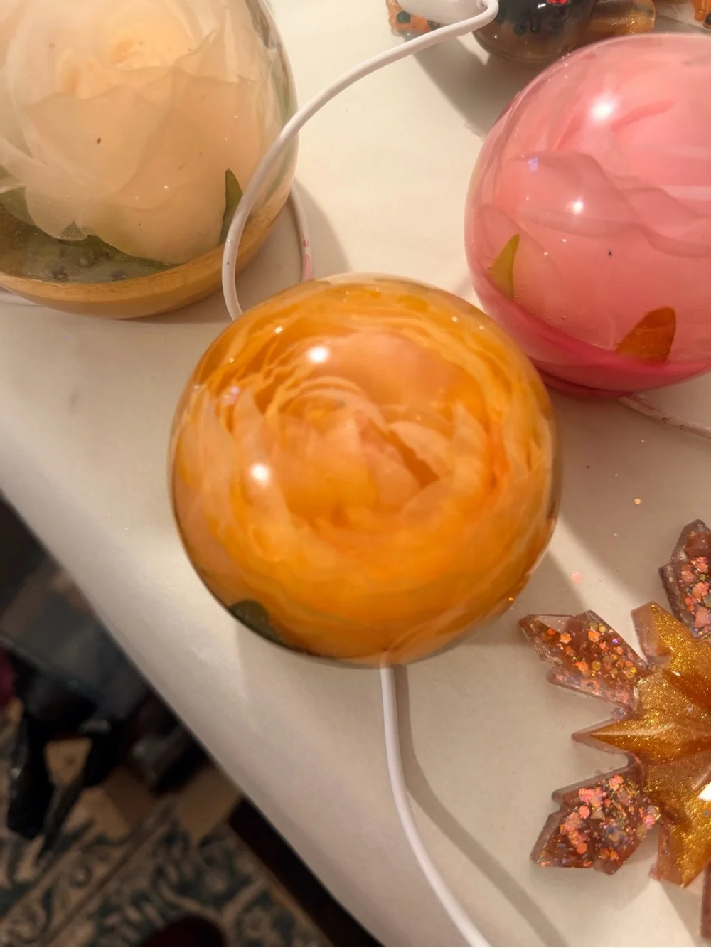 Handmade resin Decorative Orb with Amber Orange peony.